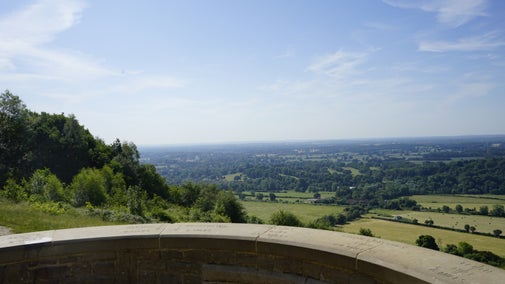 The view from Salomons' Memorial across green fields and Dorking town towards Leith Hill